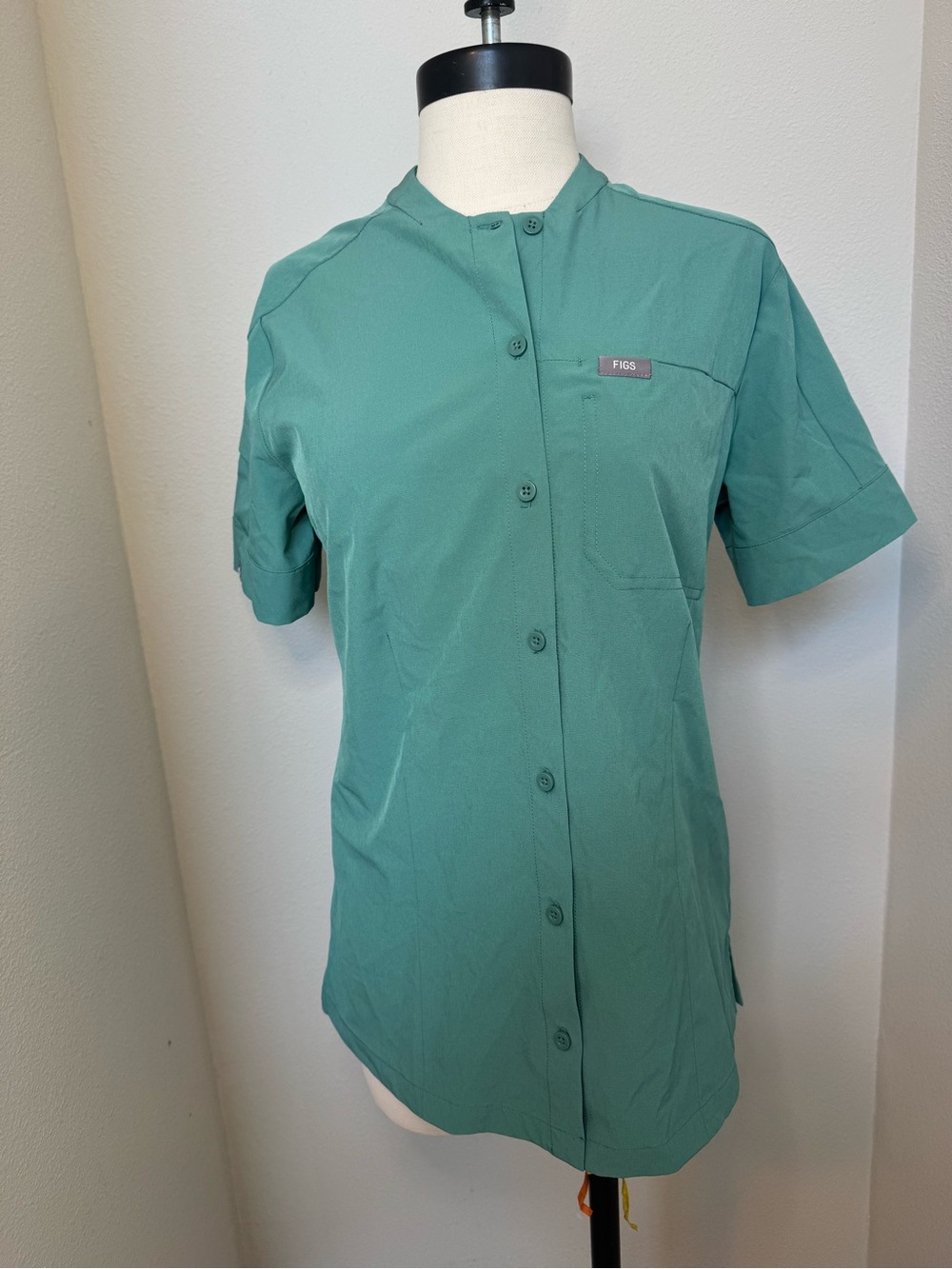 FIGS Eucalyptus Mena FreeX button-down scrub top in a green color